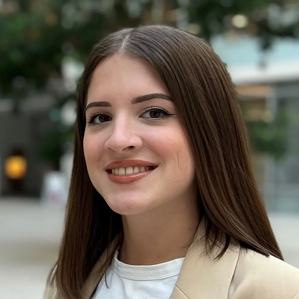 Helena Burkamp, International Senior Brand Manager for Gliss at Henkel, smiles into the camera.
