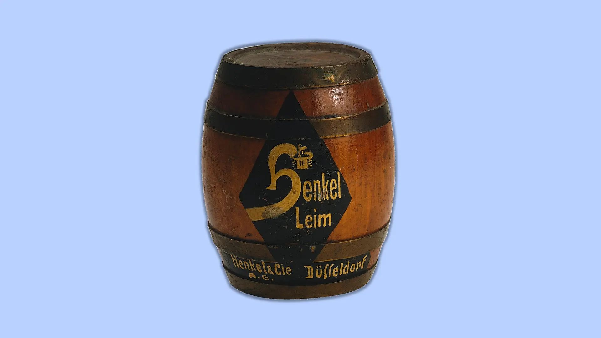 Réplique miniature d’un fût de colle Henkel imprimé datant de 1925