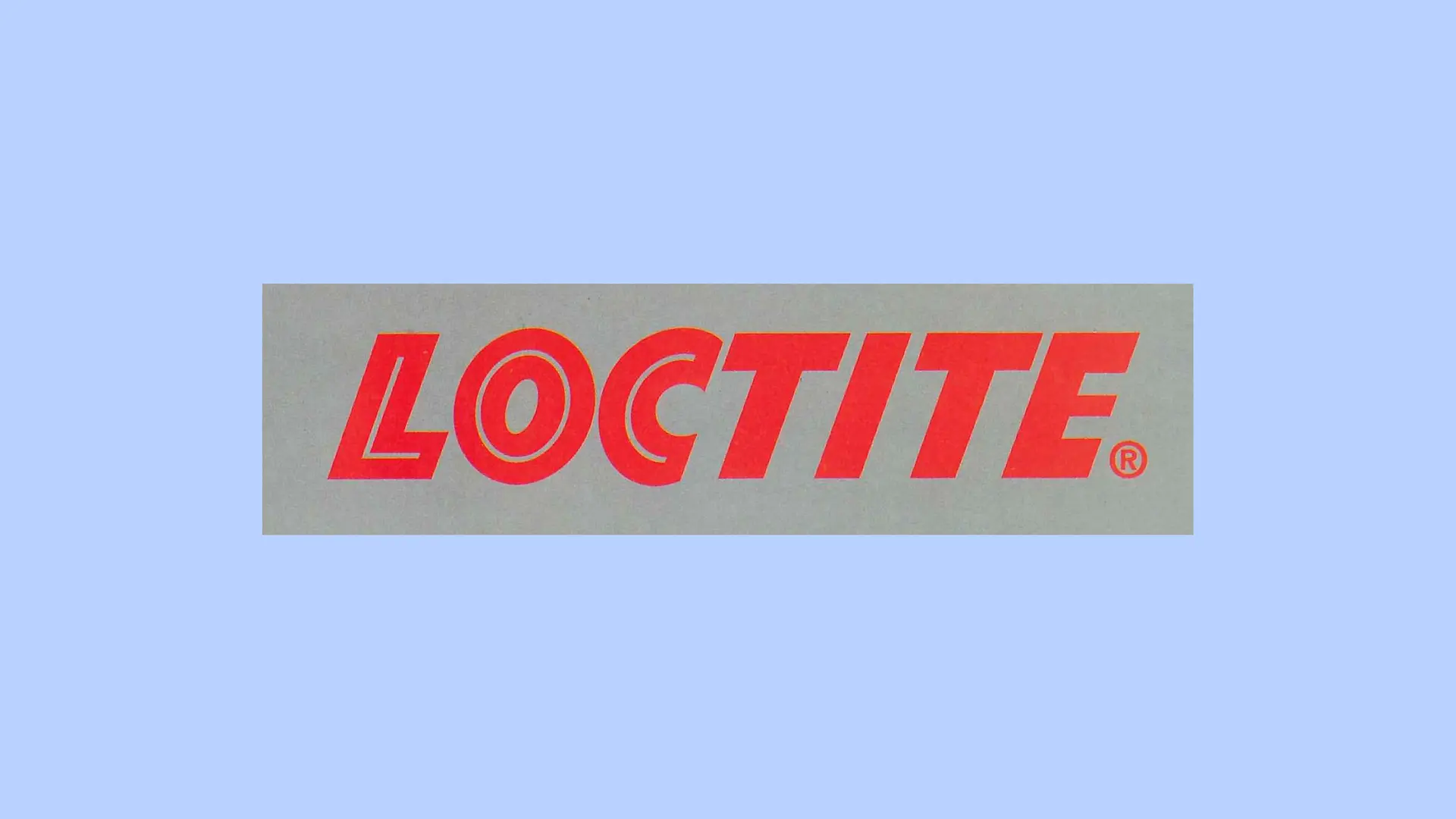 Le logo rouge Loctite sur un fond gris.