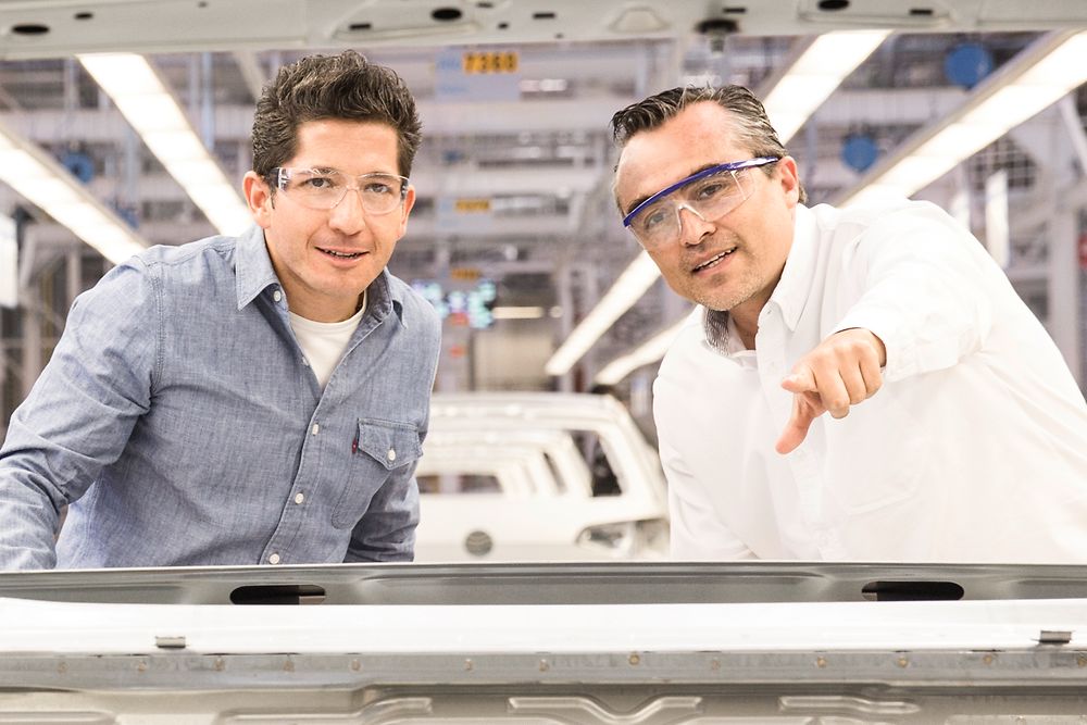 two-male-employees-in-automotive-production