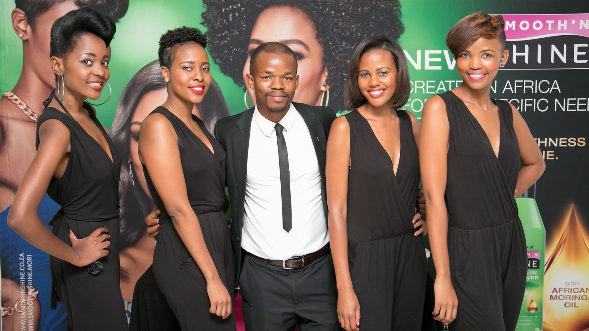 Joshua Ndala, from Schwarzkopf South Africa, (centre) with models 