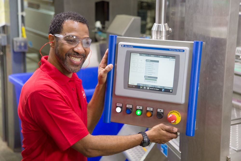 Mitchell McClerking from the St. Louis facility, works on the Renuzit® brand.